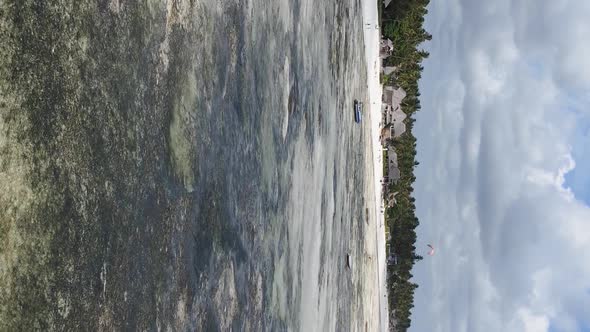 Vertical Video of Low Tide in the Ocean Near the Coast of Zanzibar Tanzania Aerial View