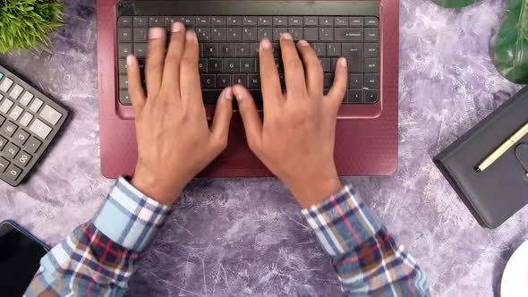 Close Up of Man Hand Typing on Laptop