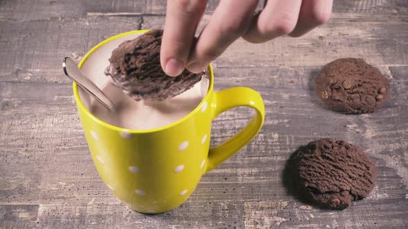 The Boy Dips Cookies in Cocoa