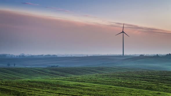 Beautiful sunrise over with a windmill in autumn, timelapse, 4K