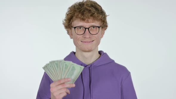 Redhead Young Man Offering Dollars, White Background