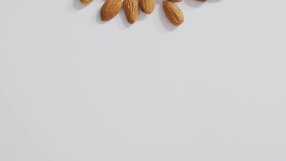 Video of almonds on white background