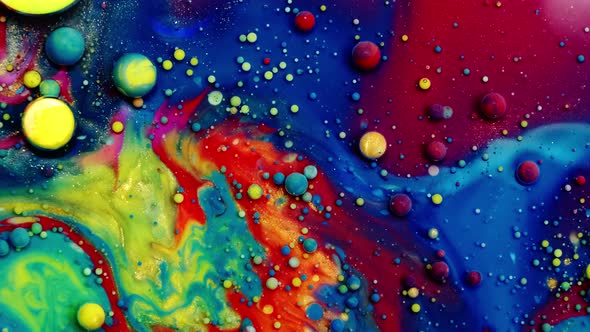 Multicolored Bubbles Of Bright Collors Moving In Paint Oil Surface Beautiful Blue Universe Of Color