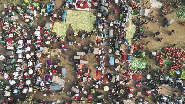 Aerial view of people in a food market in Shibganj, Rajshahi state, Bangladesh. alt