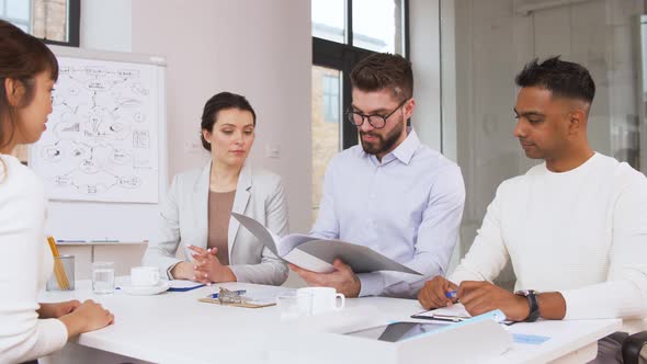 Recruiters Having Interview with Employee 