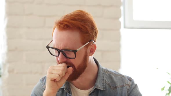 Tired Yawning Man with Beard and Red Hairs, Portrait