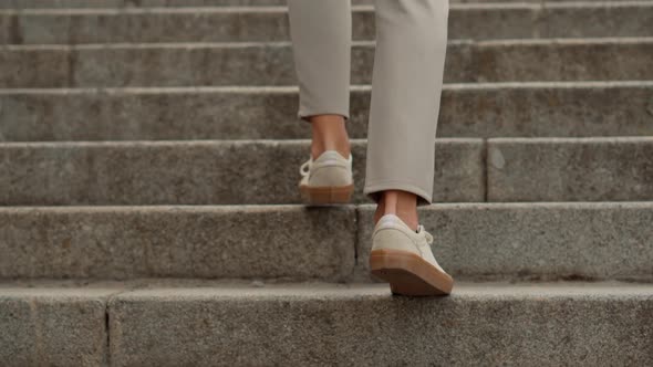 Stylish Businessman Legs Leisure Walking Up On Stairs On Vacation Holiday In Summer Day.