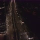 Aerial View From Drone on Glass Facade of Modern Skyscraper with Offices at Night - VideoHive Item for Sale