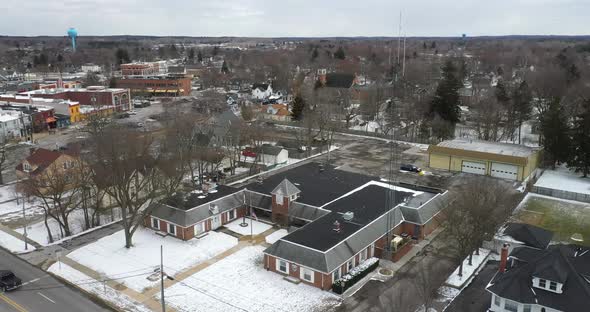 Oxford, Michigan police department building drone videoing down.