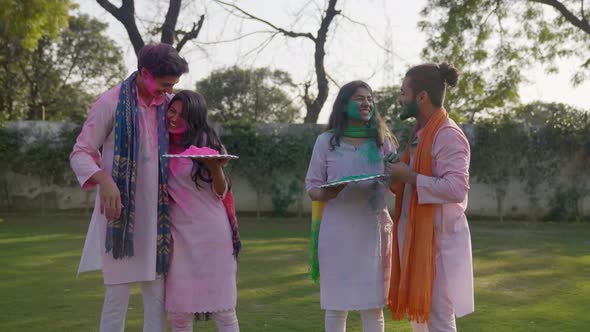 Indian men surprise their partners on Holi