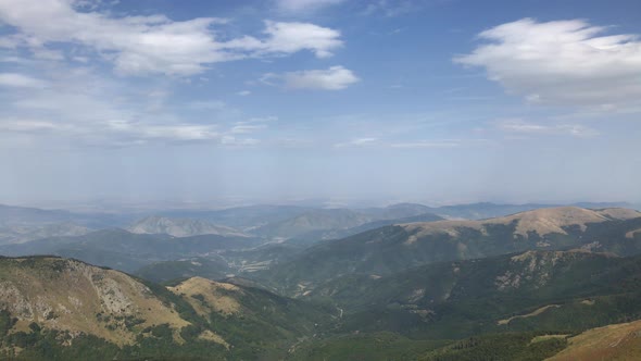 Endless valley of Bulgarian side under  Midzor peak by the day slow pan 4K 2160p 30fps UltraHD foota