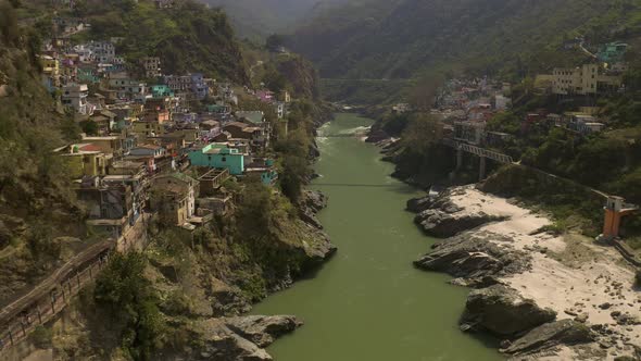 Devprayag, India, alakananda and bhagirathi holy rivers mix to become ganges, 4k aerial drone view