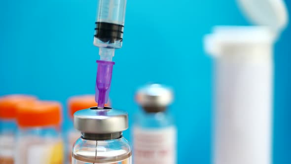 Syringe and Medicine Vial Prepare for Injection