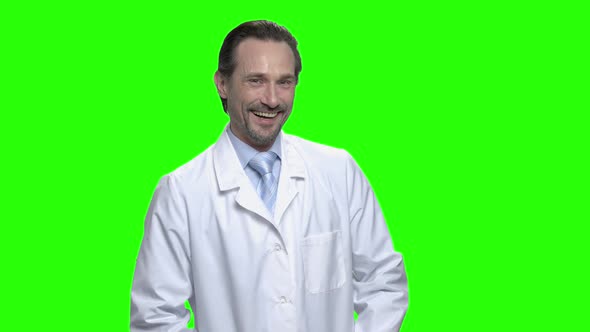 Cheerful Laughing Male Doctor in White Coat