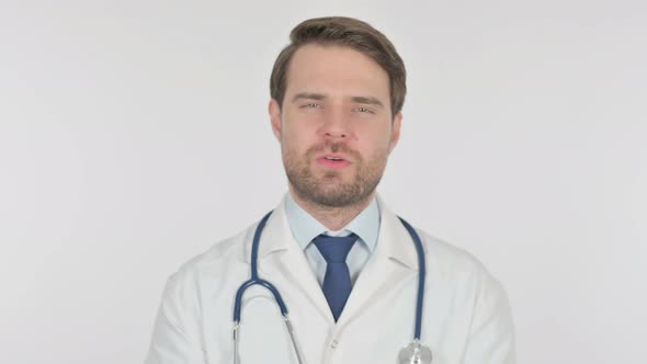 Young Doctor Talking on Online Video Call on White Background