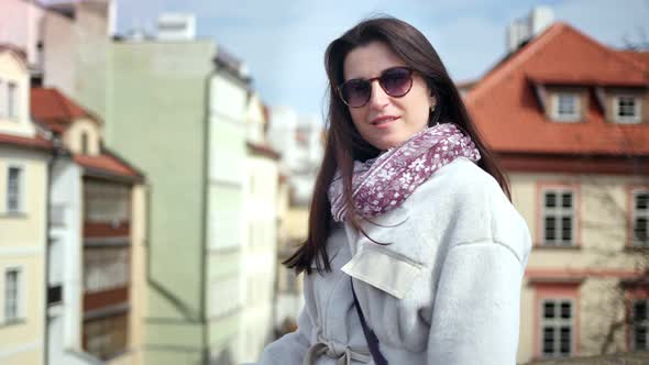 Stylish Beautiful Woman Smiling Posing Looking at Camera Outdoor Vintage Building at Background