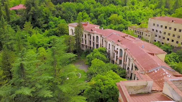 Historical Derelict Sanatorium Medea in Tskaltubo, Georgia during sunset