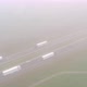 Overhead View of Cars Driving on a Highway Next to a Railroad on a Misty Day During Summer in - VideoHive Item for Sale
