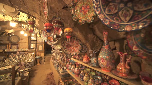 Porcelain And Pots For Sale on The Shelves in The Handmade Artistic Pottery Shop