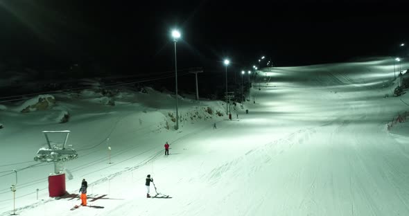 Skiers At Night Aerial View