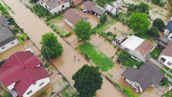 Aerial View Floods and Flooded Houses. Mass Natural Disasters and Destruction. A Big City Is Flooded