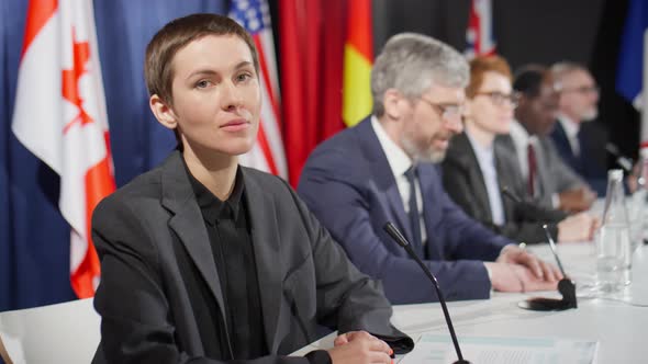 Portrait of Female Diplomat at Political Press Conference