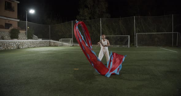 Man Performing Traditional Chinese Dragon Dance