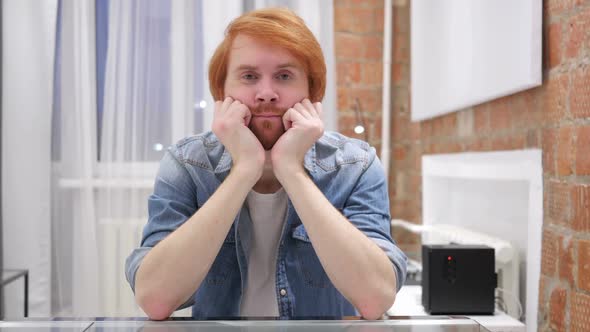 Sad Redhead Beard Man Feeling Upset and Thinking About Problems