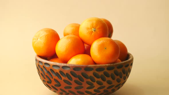 Close Up of Slice of Orange Fruits in a Bowl