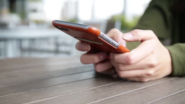 Woman using cellphone for text message