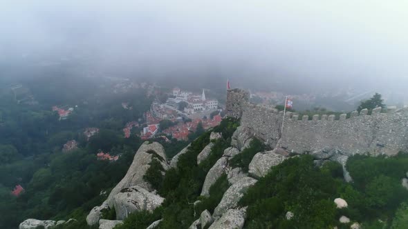 Aerial View Medieval Fortress in Mountains and Town Below