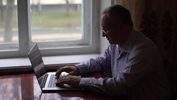 Elderly Man Uses Video Call on His Smartphone To Communicate Safely Communicate People Video Call