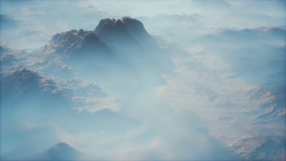 Distant Mountain Range and Thin Layer of Fog on the Valleys