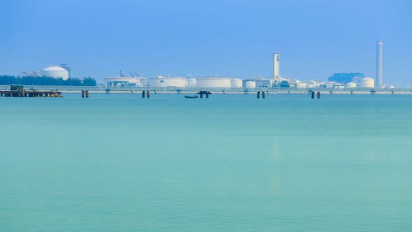 4k Time-lapse of electrical power plant near the sea coat, Rayong, Thailand