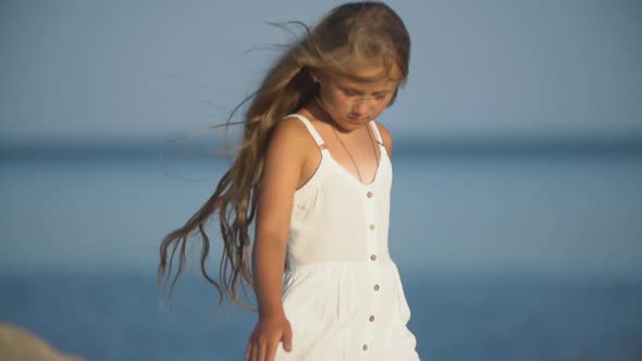 Little Girl in a White Dress