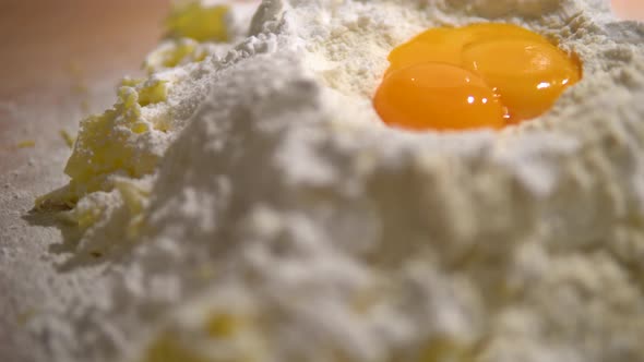 A Close Up Detail of a Mix of Grated Butter, Flour, Sugar and Egg Yolks.