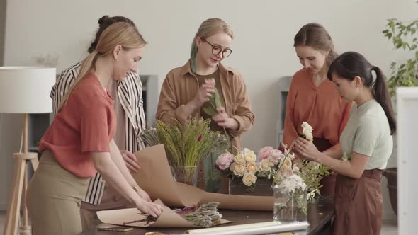 Group of Florists Working by Table