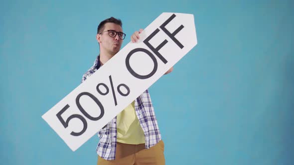 Funny Man with in Glasses with 50 Off Sign