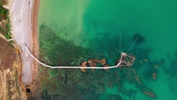 Aerial Drone Top Down View of Tropical White Beach Blue and Green Seaocean Rocks