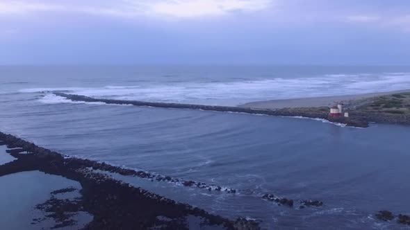 Aerial drone footage of Coquille River lighthouse in Southern Oregon, where the river meets the Paci