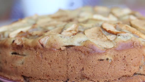 A Baked Apple Pie Is Rotated On A Stage. Cooking Charlotte At Home.