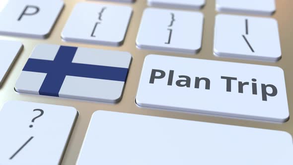 PLAN TRIP Text and Flag of Finland on Computer Keyboard