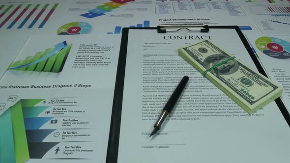 Successful Business Contract And Dollars In The Office Of A Modern Company