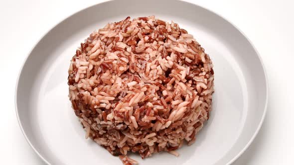 Brown rice contains minerals, vitamins and fiber which are beneficial for health.