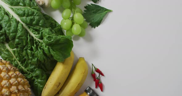 Video of fresh fruit and vegetables on white background