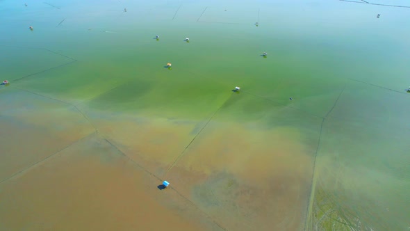 Aerial view from a drone flying over the coast. Lots of Home Krateng on the sea