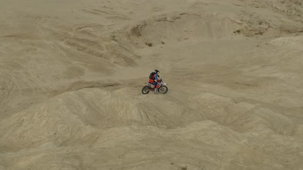 Enduro Motorcycle Rides Offroad on the Sands