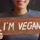 Vegan Girl Holding Wooden Sign - VideoHive Item for Sale