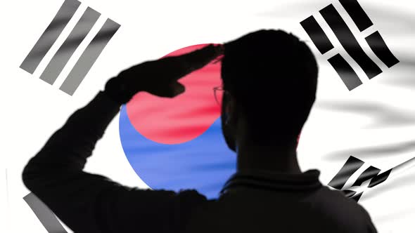 Proud Saluting Male on South Korean Flag Background