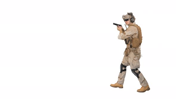 Soldier Walking Aiming with a Pistol and Shooting To Camera on White Background.